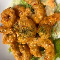 Rock Shrimp Tempura · Fried shrimp with spicy creamy sauce.
