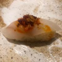Fluke/Hirame Garlic Sushi · With chili garlic sauce and garlic chips.