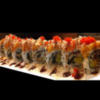 Hawaiian Roll · Eel and mango on top with spicy crunchy salmon and tobiko.