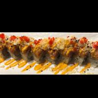 Lion King Roll · Salmon and mango on top with spicy crunchy salmon.