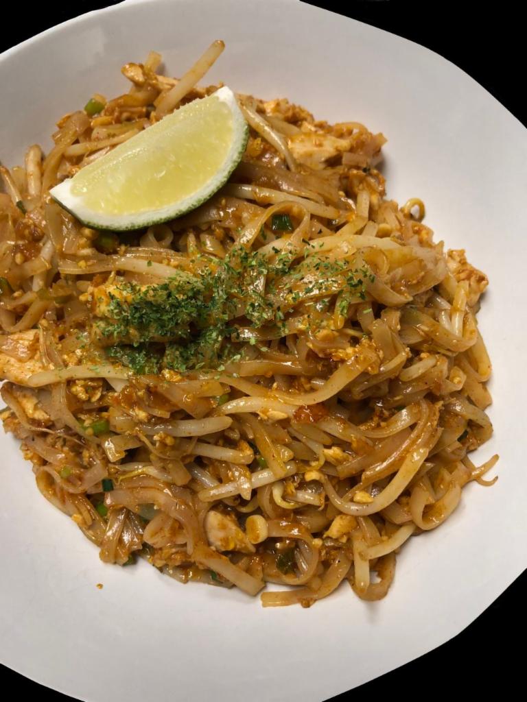 Pad Thai Chicken · Stir-fried rice noodles with egg, peanuts, bean sprouts and scallions. Served with soup or salad.