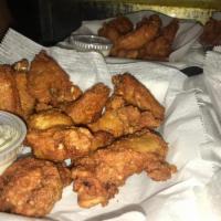 12 Piece Buffalo Chicken Wings · Hot or mild with blue cheese.