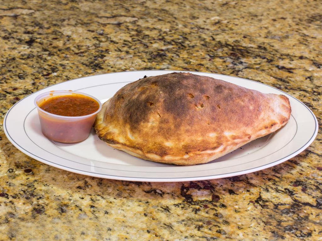 Cheese Calzone · Ricotta and mozzarella. Served with homemade sauce.