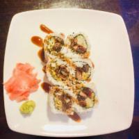 Salmon Skin Roll · Grilled Salmon Skin with cucumber, with eel sauce on top