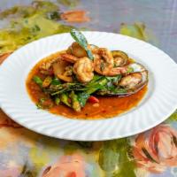 Pad Poh Taek · Thai savory fresh red chili sauce with scallops, shrimp, mussels and calamari, fresh asparag...
