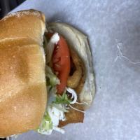 Milanesa de Pollo Torta · Breaded chicken cutlet. Marinated pork with onions and pineapple. Homemade soft roll, layere...