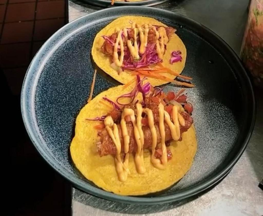 TACOS DE PESCADO · Tilapia Baja style, chipotle mayo, coleslaw, salsa morita, pico de gallo, served with rice and beans