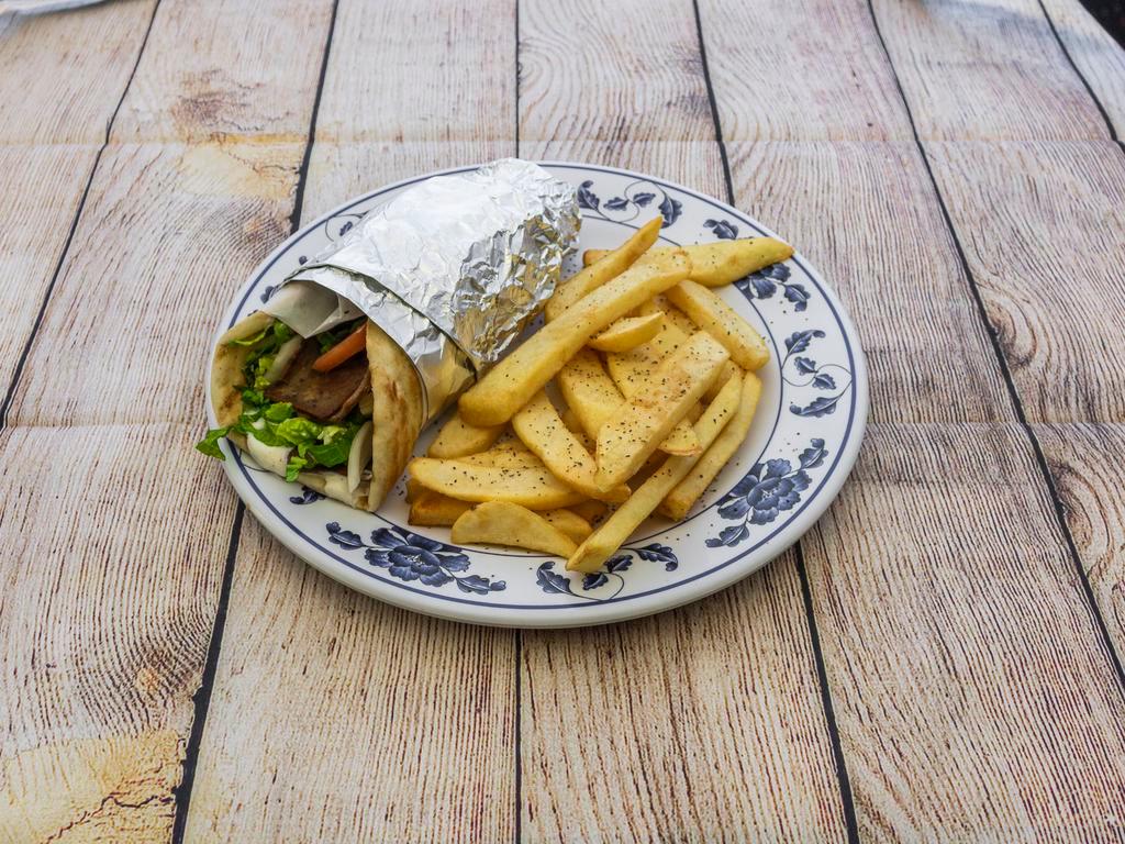 Lamb Gyro Sandwich · served on pita bread and french fries