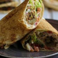 Falafel Wrap · Made from ground chickpeas, fava beans, or both. Herbs, spices, and onion relatives are comm...