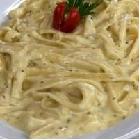 Fettuccini Alfredo Pasta · Rich butter and Parmesan sauce.