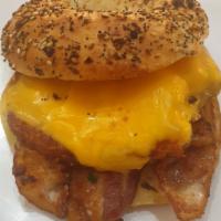 Bacon Hash Brown & melted american Cheese on BAGEL NO EGGS · No eggs