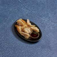 11. Pan Fried Wonton · 12 pieces. Chinese dumpling that comes with filling.