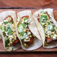 Tacos · Choice of Cod, BBQ Brisket, or Pulled Chicken. 3 per Order. 

Avocado, Jalapeno Slaw, Corn T...