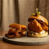  Fried Chicken Sandwich · Jalapeno Coleslaw, Pickles, Roasted Chili Aioli.