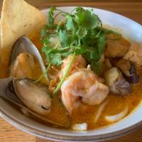 Seafood Curry Noodle Soup · select your noodle and top with shrimps, scallops, mussels, fish balls, tofu, eggplants, str...