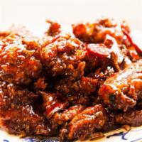 General Tso's Chicken · Chunks of dark chicken meat and dried red pepper sauteed with chef's special sauce.