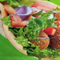 Falafel Sandwich · Comes with salad, 2 cups white sauce and 1 cup hot sauce.