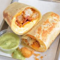Bacon, Egg and Cheddar Burrito  · 3 fresh cracked cage-free scrambled eggs, melted cheddar  cheese, smokey bacon and crispy po...