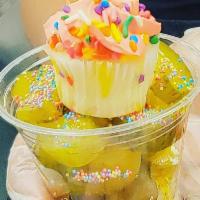 8. Birthday Cake  · Birthday Cake candy pickles, sprinkles, mini cupcake, cake batter snowcone drizzle. 
