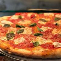 Tonino's Special Pizza · Fresh mozzarella, garlic, tomato, and basil.