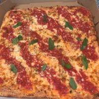 Godmother Pizza with Extra Toppings · Mozzarella, plum tomato, basil and fresh garlic.