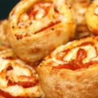 Pepperoni Pinwheel Roll · Pizza dough pepperoni and mozzarella.