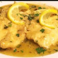 Chicken Francese  · Sauteed chicken cutlets with lemon and butter in a white wine sauce.