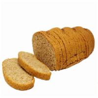 22 oz. Whole Wheat Bread · Artisinal thick crust whole wheat bread in an oblong hearth pan loaf