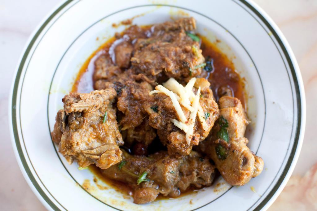 Chicken Karahi · Delicious chicken prepared Lahori style with special spices and herbs. Served with plain rice.