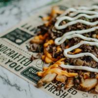 Philly Cheesesteak Loaded Fries · Beer battered fries topped with steak, green peppers, onions, nacho cheese, ＆ mayo