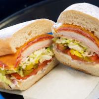 The Mess Sub · Ham, turkey breast, pepperoni, salami, cheddar, Swiss cheese, tomato, lettuce, onion, mayonn...