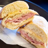Reuben Sub · Pastrami, Swiss cheese, and the best sauerkraut with 1000 Island dressing toasted on a Frenc...