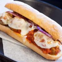 Meatball Sub · Italian meatballs in marinara sauce, provolone cheese, and red onion toasted on a French roll.