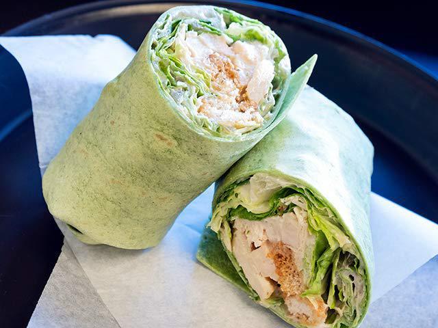 Caesar Wrap with Chicken · Romaine lettuce, Parmesan cheese, croutons, and Caesar dressing in a spinach tortilla.