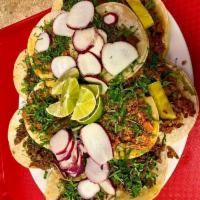 Pollo Taco / Chicken  · Comes with onions, cilantro, radishes & lime. 
