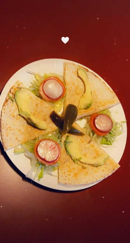 Asada quesadilla / beef  · Flour tortilla comes with meat, garnished with lettuce, tomatoes, avocados, & jalapenos. 