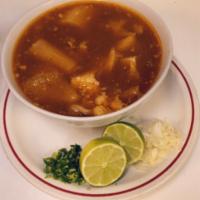 Red Menudo · Mexican soup made with cow's stomach in a broth. lime oregano onions and tortilla on the side