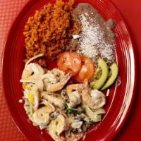 Camarones Crema · shrimp onions bell peppers mushrooms in sour cream rice beans and tortillas 
