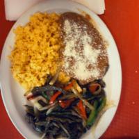 Fajita Vegetarian · Mixed vegetables. Served with sour cream and guacamole, tortillas rice and beans.