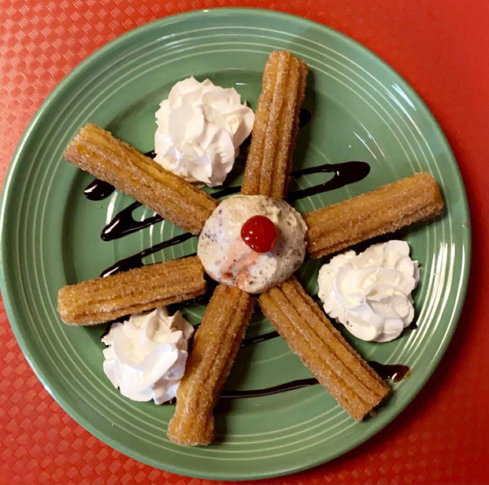 Churros with ice cream · 6 piece of churros 1 scoop of ice cream whipped cream and chocolate 