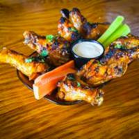 Wings · 8 smoked wings. Served with a choice of celery or carrots and a choice of a ranch or blue ch...