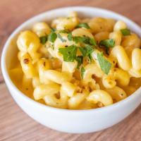 Mac & Cheese · Cavatappi pasta enveloped in a rich and creamy cheese sauce. Topped with a blend of shredded...