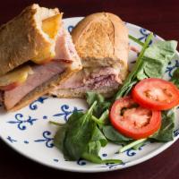 Ham and Brie Sandwich · Black Forest Ham, apple slices, melted Brie cheese with French dijon mustard. 