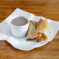 42. Tamal Plate · Rice and beans. 2 tamales.