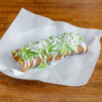44. Flautas · Rolled taco with chicken comes with lettuce, Mexican cheese and sour cream.
