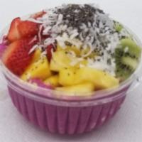 Coconut Pitaya Bowl · Organic pitaya blended with: coconut, pineapple, kiwi & almond milk. Topped with: granola, k...
