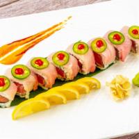 Blue Ocean Roll · Spicy scallop, avocado, crunch inside tobiko, topped with yellowtail, jalapeno and spicy chi...