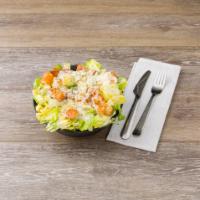 Caesar Salad · Romaine lettuce tossed with Parmigiano-Reggiano, garlic croutons and Caesar dressing.