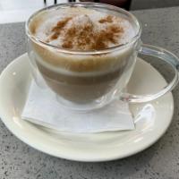Cappuccino · Steam milk foam, espresso shot and cinnamon.