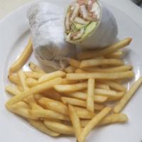 Chicken Caprese Wrap · Chicken cutlet, tomato, basil, red onion and fresh mozzarella. Served with French fries.